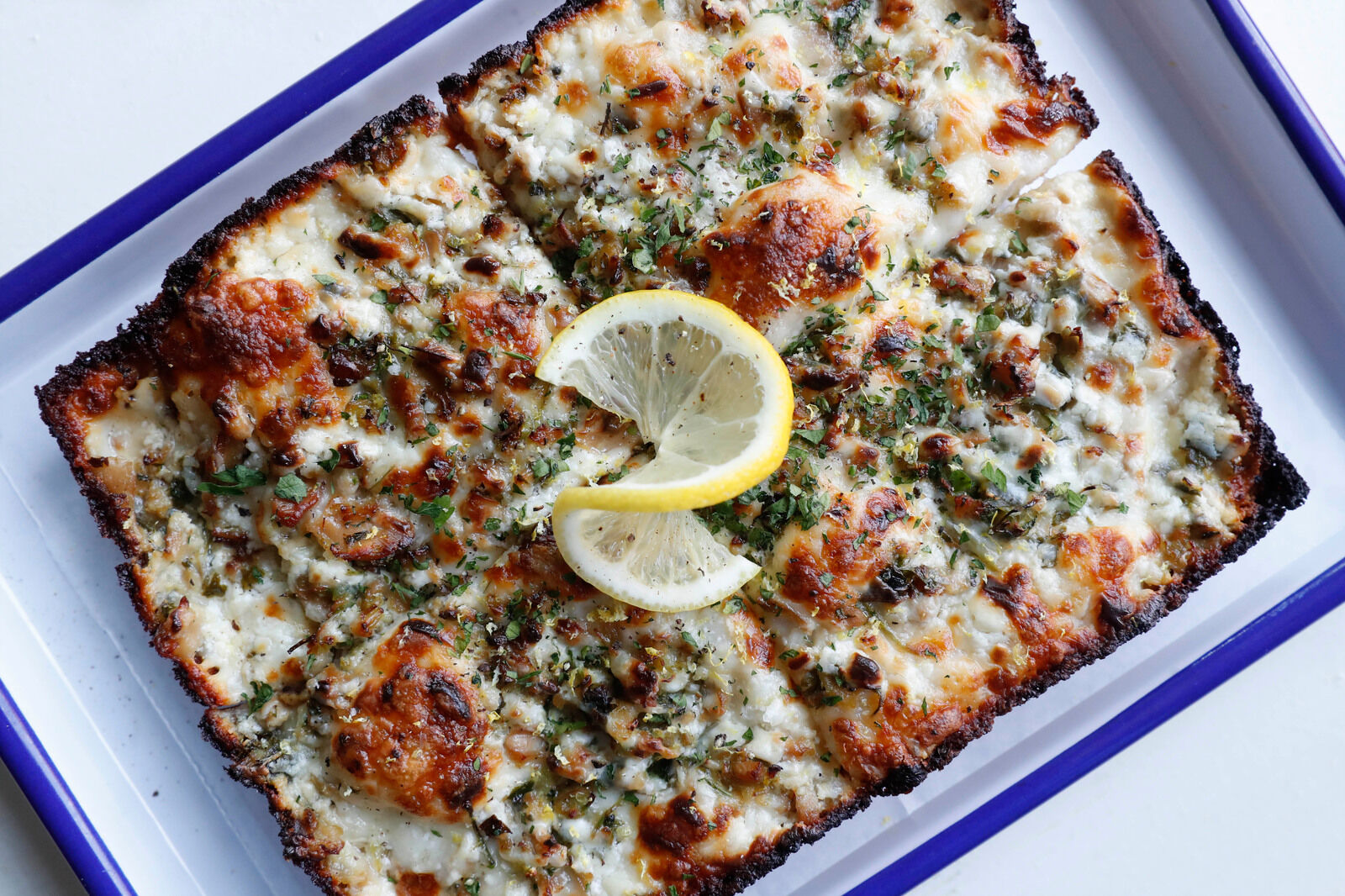Detroit-style clam & lemon pizza at Marble + Rye
